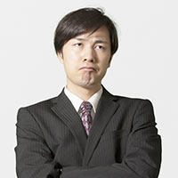 写真:悩む人
